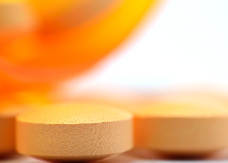 A bottle of pills macro for background or copy space.の写真素材