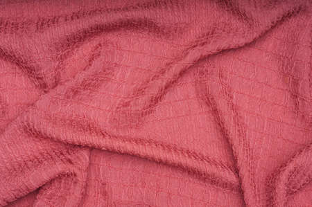 Embossed silk pink fabric textureの写真素材