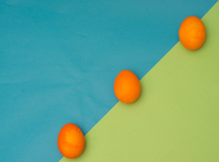 Creative minimalistic layout of easter eggs on trendy background.Easter concept