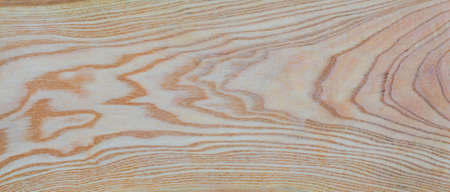 Closeup of ash wood chopping boardの写真素材