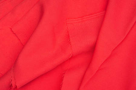 Creased red gabardine. Rumpled textureの写真素材