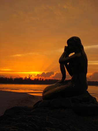 mermaid statue silhoutte の写真素材