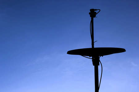 satellite dish on blue skyの写真素材