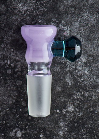 Bottle on a dark background, close-up.