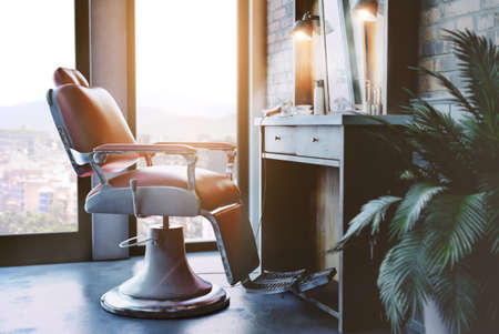 Barber shop chair in industrial space.の写真素材