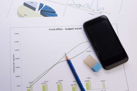 Diagram with mobile and penの写真素材