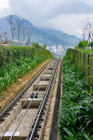 view of the cable car rails and the beautiful mountains of northern Vietnam. Funicular on Fancipan
