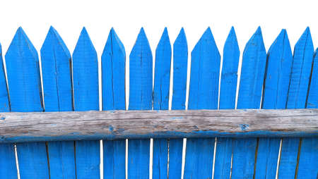 rough blue wooden picket fence. isolated on white backgroundの写真素材