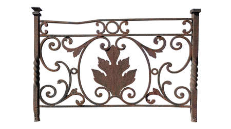 ancient rusty forged element of the fence. rounded ornament with an oak leaf in the center. isolated on white backgroundの写真素材