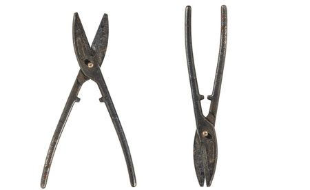 old vintage rusty heavy duty snips tin and metal cutting scissors for straight cut and wire cut. isolated on white backgroundの写真素材