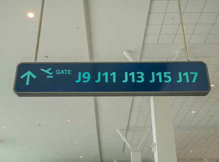 Departure Gate Sign in the Airport at Kuala Lumpur International Airportの写真素材