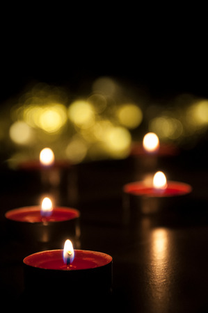 Romantic candles bokeh. Glowing candles from top.の写真素材