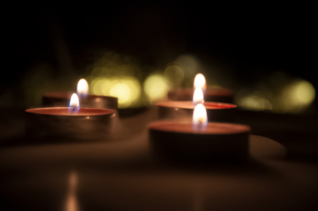 Romantic candles bokeh. Glowing candles from top.の写真素材