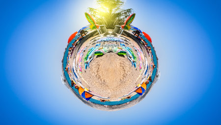 Little planet of people having fun a the beach, seasideの写真素材