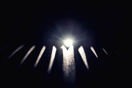 Strong white light coming from the end of acoustic foam. Music background.の写真素材