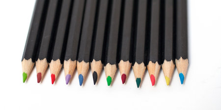 Colored school pencils stacked. Macro