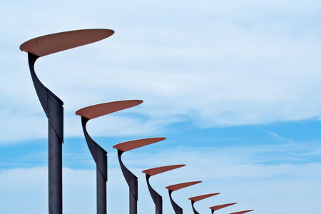 Lampposts group on the blue skyの写真素材