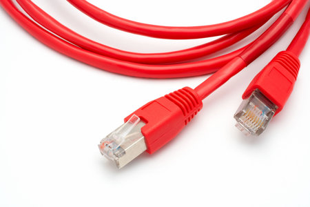 Two red network cables isolated on white background