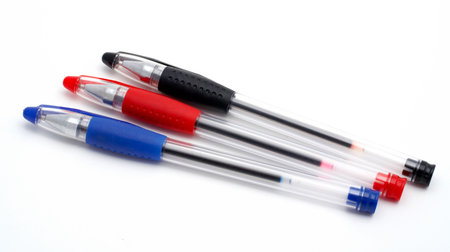 Three ballpoints isolated on white background