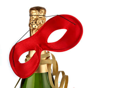 Detail of champagne bottle with red mask and ribbonsの写真素材