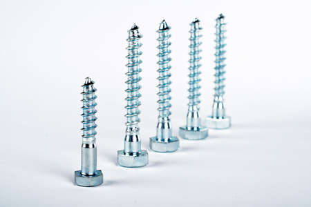 Team with focus on the leader, on white backgroundの写真素材