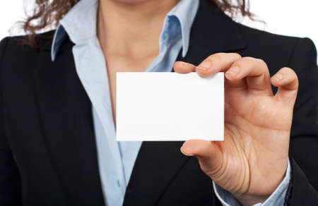 Business woman holding one blank card over a white backgroundの写真素材