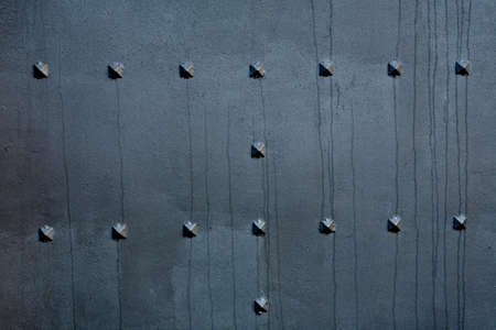 A old metal background with some rivetsの写真素材