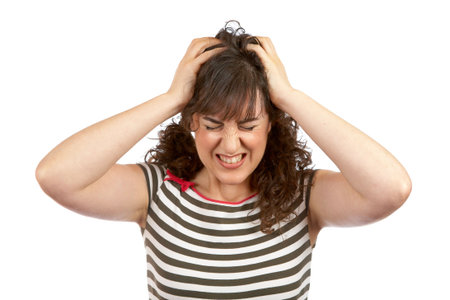 Angered young woman over a white background