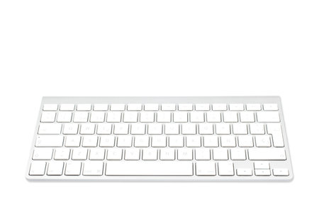 A wireless aluminum keyboard, with soft shadow on white background