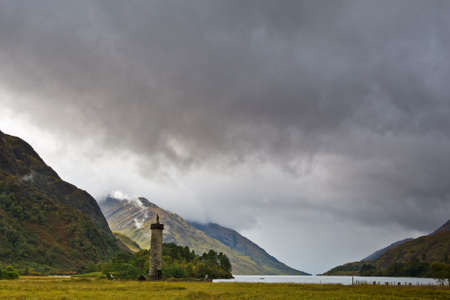 Glenfinnan Monument and Loch Shiel in autumn, Scotlandの写真素材