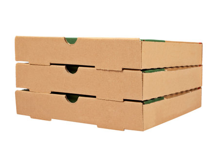 Three pizzas cardboard boxes isolated on white backgroundの写真素材