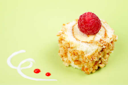 Delicious cake with soft shadow on green dish. Shallow DOFの写真素材