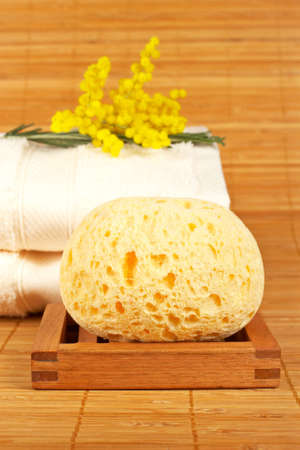 Bath accessories and beauty products on bamboo mat background. Shallow DOFの写真素材