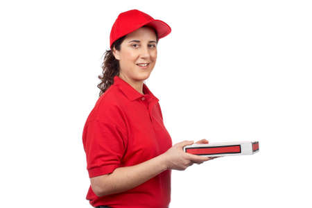 A pizza delivery woman holding a hot pizza. Isolated on whiteの写真素材