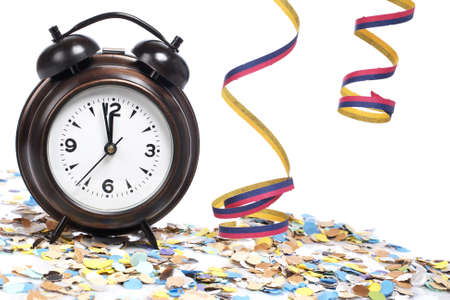 Waiting the New Year with clock, confetti and ribbons. Shallow depth of fieldの写真素材
