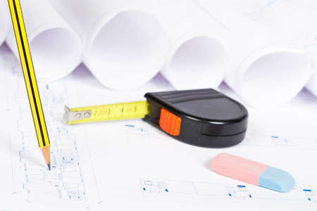 Construction plans and drawing tools. Shallow depth of fieldの写真素材