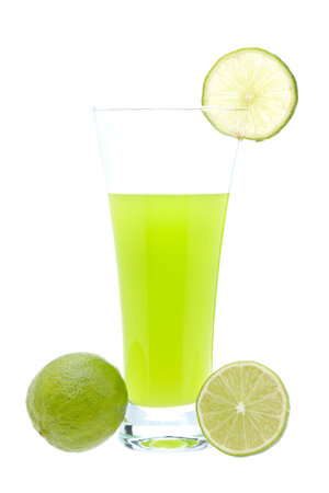 A glass of fresh lime juice with a slice on white background