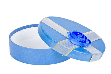 Gift box with ribbon, isolated on white background. Shallow depth of fieldの写真素材