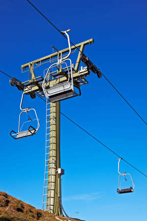 Ski lift tower under high mountains, Spainの写真素材