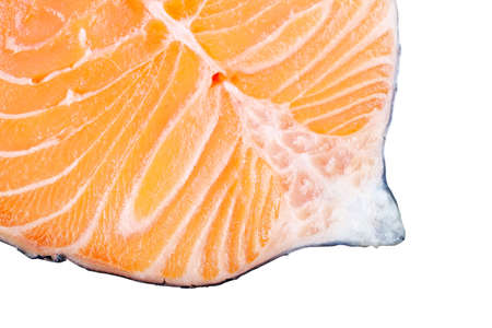A fresh salmon steak on a white background. の写真素材