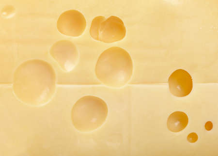 A bakground of fresh and tasty cheeseの写真素材