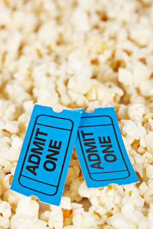 Two tickets on popcorn background. Shallow depth of fieldの写真素材