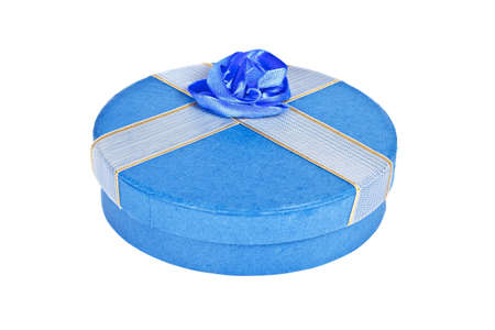 Gift box with ribbon, isolated on white background. Shallow depth of fieldの写真素材