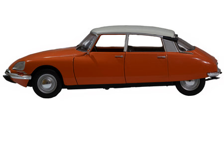 19 April 2023 Paris, France. A scale model of a bright red Citroen DS from an exhibit in the Musee des Arts et Metiers. Isolated on white with clipping path.のeditorial素材