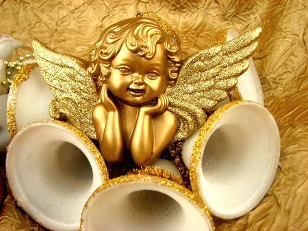 A small angel white white bells on backgroundの写真素材