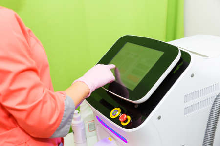 Selection of settings on the device for laser hair removal. Hair removal, depilation. Clear skin.の写真素材