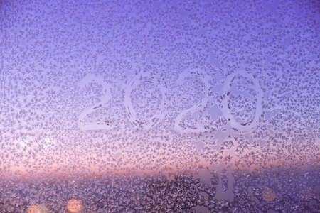 Winter texture of new year 2020. Color texture on glass from cold airの写真素材