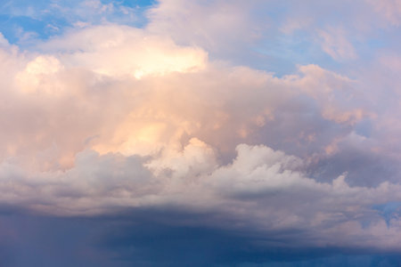 Big and thick clouds on the horizon. Blue sky with thick clouds