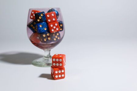 Dice are red on a white background