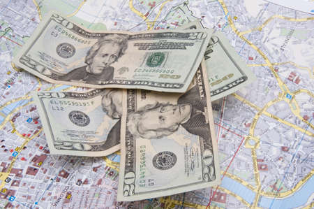 American money on a map represents the cost of travel.の写真素材